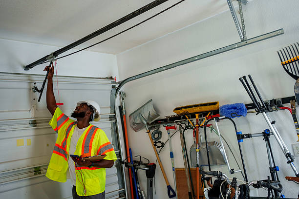 Professional Garage Door Installation technician working in Greenwood, IN